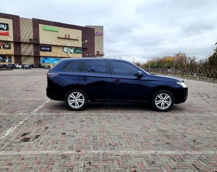 Синий Мицубиси Аутлендер, объемом двигателя 2 л и пробегом 314 тыс. км за 10999 $, фото 7 на Automoto.ua