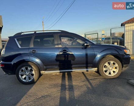 Синий Мицубиси Аутлендер, объемом двигателя 2.2 л и пробегом 192 тыс. км за 12990 $, фото 5 на Automoto.ua