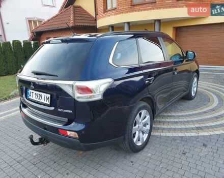 Синий Мицубиси Аутлендер, объемом двигателя 2.2 л и пробегом 190 тыс. км за 11900 $, фото 4 на Automoto.ua