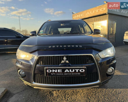 Синий Мицубиси Аутлендер, объемом двигателя 2.2 л и пробегом 192 тыс. км за 13490 $, фото 3 на Automoto.ua