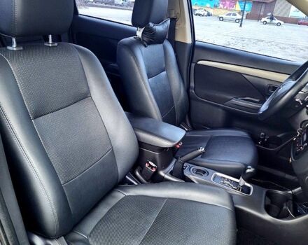 Синий Мицубиси Аутлендер, объемом двигателя 2 л и пробегом 314 тыс. км за 10999 $, фото 9 на Automoto.ua