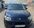 Синий Мицубиси Аутлендер, объемом двигателя 2.4 л и пробегом 264 тыс. км за 9300 $, фото 1 на Automoto.ua