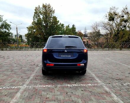 Синий Мицубиси Аутлендер, объемом двигателя 2 л и пробегом 314 тыс. км за 10999 $, фото 5 на Automoto.ua