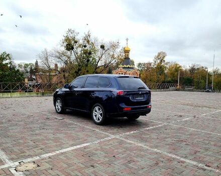 Синий Мицубиси Аутлендер, объемом двигателя 2 л и пробегом 314 тыс. км за 10999 $, фото 4 на Automoto.ua