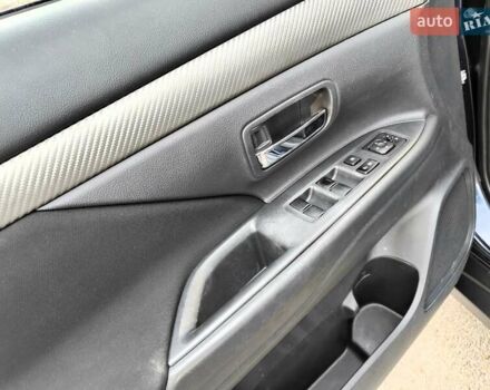 Синій Міцубісі Аутлендер, об'ємом двигуна 2.4 л та пробігом 213 тис. км за 10990 $, фото 34 на Automoto.ua