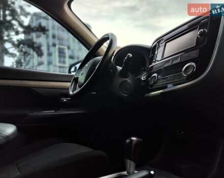 Синій Міцубісі Аутлендер, об'ємом двигуна 2.4 л та пробігом 213 тис. км за 10990 $, фото 49 на Automoto.ua