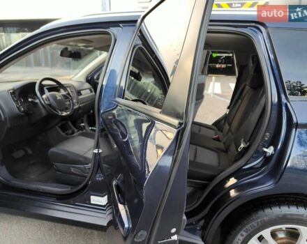 Синій Міцубісі Аутлендер, об'ємом двигуна 2.4 л та пробігом 213 тис. км за 10990 $, фото 5 на Automoto.ua