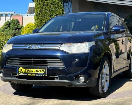 Синий Мицубиси Аутлендер, объемом двигателя 2.4 л и пробегом 174 тыс. км за 8999 $, фото 2 на Automoto.ua