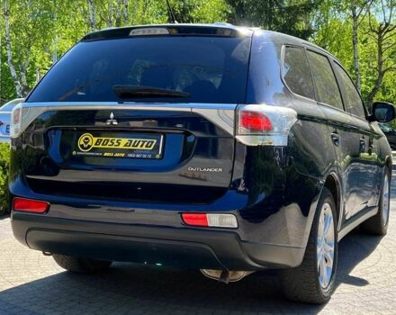 Синий Мицубиси Аутлендер, объемом двигателя 2.4 л и пробегом 174 тыс. км за 8999 $, фото 6 на Automoto.ua