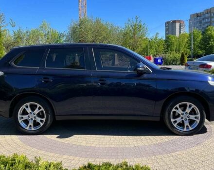 Синий Мицубиси Аутлендер, объемом двигателя 2.4 л и пробегом 174 тыс. км за 8999 $, фото 7 на Automoto.ua