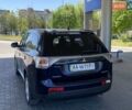 Синий Мицубиси Аутлендер, объемом двигателя 2 л и пробегом 154 тыс. км за 13600 $, фото 12 на Automoto.ua