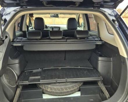 Синій Міцубісі Аутлендер, об'ємом двигуна 2.36 л та пробігом 183 тис. км за 14000 $, фото 11 на Automoto.ua