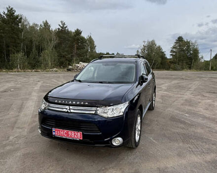 Синій Міцубісі Аутлендер, об'ємом двигуна 2.3 л та пробігом 230 тис. км за 11950 $, фото 1 на Automoto.ua