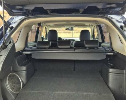 Синій Міцубісі Аутлендер, об'ємом двигуна 2.36 л та пробігом 183 тис. км за 14000 $, фото 10 на Automoto.ua