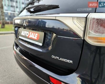 Синій Міцубісі Аутлендер, об'ємом двигуна 2.4 л та пробігом 213 тис. км за 10990 $, фото 17 на Automoto.ua