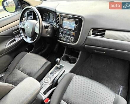 Синій Міцубісі Аутлендер, об'ємом двигуна 2.4 л та пробігом 213 тис. км за 10990 $, фото 48 на Automoto.ua