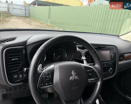 Синий Мицубиси Аутлендер, объемом двигателя 3 л и пробегом 180 тыс. км за 13000 $, фото 10 на Automoto.ua