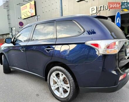 Синій Міцубісі Аутлендер, об'ємом двигуна 2.4 л та пробігом 213 тис. км за 10990 $, фото 12 на Automoto.ua