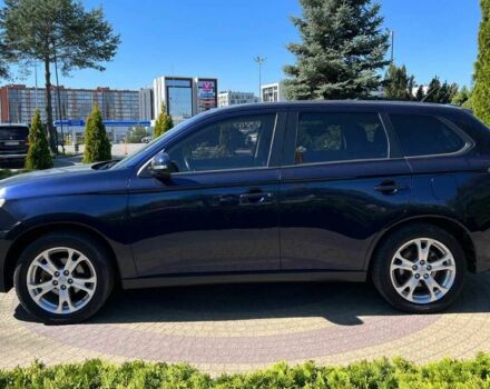 Синий Мицубиси Аутлендер, объемом двигателя 2.4 л и пробегом 174 тыс. км за 8999 $, фото 3 на Automoto.ua