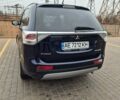Синій Міцубісі Аутлендер, об'ємом двигуна 2.36 л та пробігом 183 тис. км за 14000 $, фото 4 на Automoto.ua
