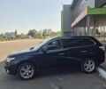 Синий Мицубиси Аутлендер, объемом двигателя 2.4 л и пробегом 184 тыс. км за 13205 $, фото 1 на Automoto.ua