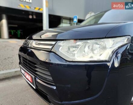 Синій Міцубісі Аутлендер, об'ємом двигуна 2.4 л та пробігом 213 тис. км за 10990 $, фото 1 на Automoto.ua