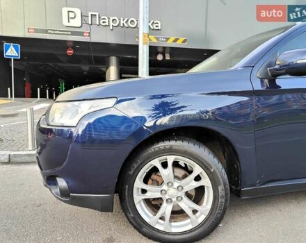 Синій Міцубісі Аутлендер, об'ємом двигуна 2.4 л та пробігом 213 тис. км за 10990 $, фото 4 на Automoto.ua