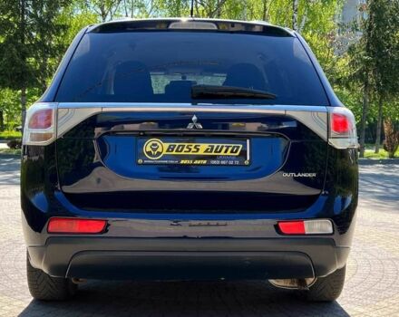 Синий Мицубиси Аутлендер, объемом двигателя 2.4 л и пробегом 174 тыс. км за 8999 $, фото 5 на Automoto.ua