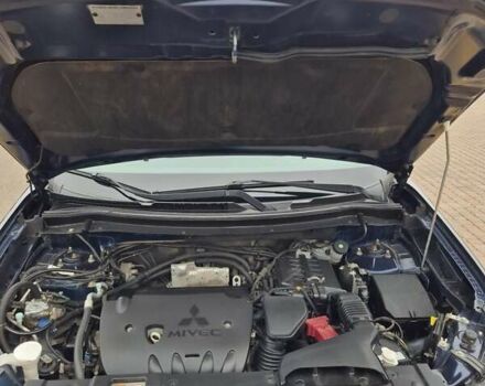 Синій Міцубісі Аутлендер, об'ємом двигуна 2.36 л та пробігом 183 тис. км за 14000 $, фото 19 на Automoto.ua