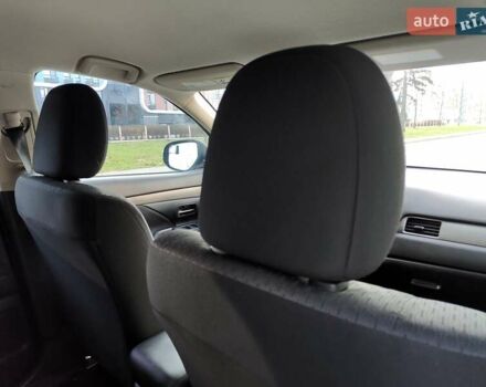 Синій Міцубісі Аутлендер, об'ємом двигуна 2.4 л та пробігом 213 тис. км за 10990 $, фото 56 на Automoto.ua