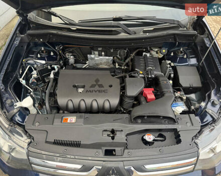 Синий Мицубиси Аутлендер, объемом двигателя 2 л и пробегом 218 тыс. км за 12550 $, фото 47 на Automoto.ua