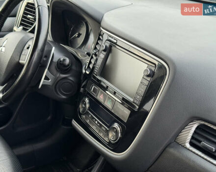 Синий Мицубиси Аутлендер, объемом двигателя 2 л и пробегом 218 тыс. км за 12550 $, фото 37 на Automoto.ua