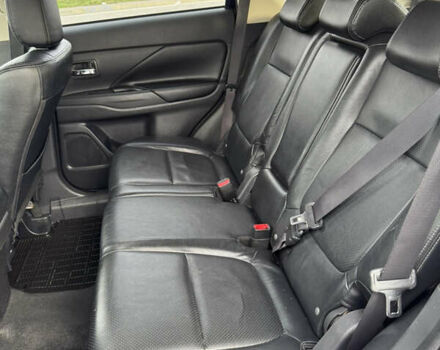 Синий Мицубиси Аутлендер, объемом двигателя 2 л и пробегом 218 тыс. км за 12550 $, фото 32 на Automoto.ua