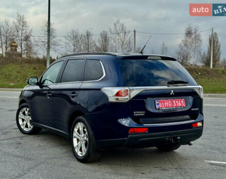 Синий Мицубиси Аутлендер, объемом двигателя 2 л и пробегом 218 тыс. км за 12550 $, фото 2 на Automoto.ua