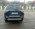 Синий Мицубиси Аутлендер, объемом двигателя 2.4 л и пробегом 230 тыс. км за 11300 $, фото 4 на Automoto.ua