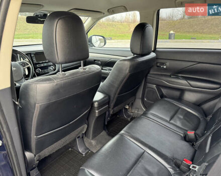 Синий Мицубиси Аутлендер, объемом двигателя 2 л и пробегом 218 тыс. км за 12550 $, фото 31 на Automoto.ua