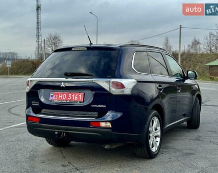Синий Мицубиси Аутлендер, объемом двигателя 2 л и пробегом 218 тыс. км за 12550 $, фото 4 на Automoto.ua