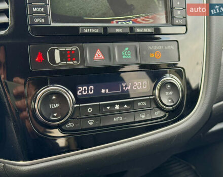 Синий Мицубиси Аутлендер, объемом двигателя 2 л и пробегом 218 тыс. км за 12550 $, фото 24 на Automoto.ua