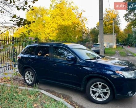 Синий Мицубиси Аутлендер, объемом двигателя 2.4 л и пробегом 230 тыс. км за 11300 $, фото 2 на Automoto.ua