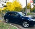 Синий Мицубиси Аутлендер, объемом двигателя 2.4 л и пробегом 230 тыс. км за 11300 $, фото 2 на Automoto.ua