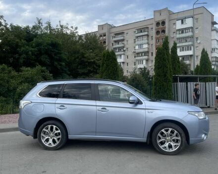 Синий Мицубиси Аутлендер, объемом двигателя 2 л и пробегом 153 тыс. км за 15499 $, фото 1 на Automoto.ua