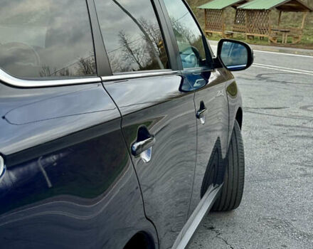 Синий Мицубиси Аутлендер, объемом двигателя 2 л и пробегом 218 тыс. км за 12550 $, фото 11 на Automoto.ua