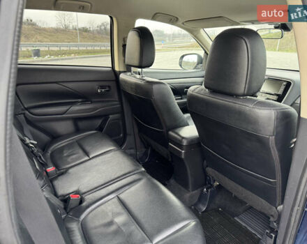 Синий Мицубиси Аутлендер, объемом двигателя 2 л и пробегом 218 тыс. км за 12550 $, фото 39 на Automoto.ua