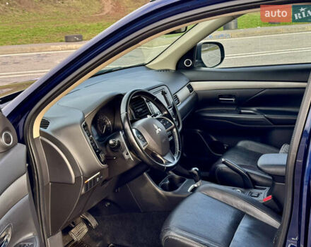 Синий Мицубиси Аутлендер, объемом двигателя 2 л и пробегом 218 тыс. км за 12550 $, фото 14 на Automoto.ua