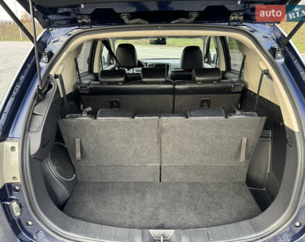 Синий Мицубиси Аутлендер, объемом двигателя 2 л и пробегом 218 тыс. км за 12550 $, фото 43 на Automoto.ua