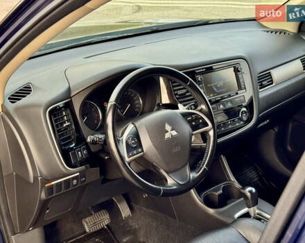 Синий Мицубиси Аутлендер, объемом двигателя 2 л и пробегом 218 тыс. км за 12550 $, фото 13 на Automoto.ua