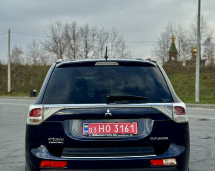 Синий Мицубиси Аутлендер, объемом двигателя 2 л и пробегом 218 тыс. км за 12550 $, фото 3 на Automoto.ua