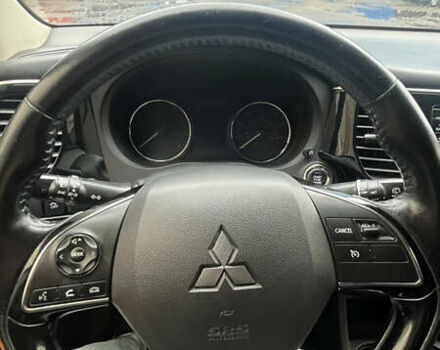 Синий Мицубиси Аутлендер, объемом двигателя 2.36 л и пробегом 203 тыс. км за 14200 $, фото 4 на Automoto.ua