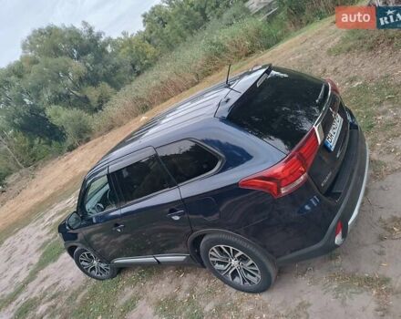 Синий Мицубиси Аутлендер, объемом двигателя 2.36 л и пробегом 135 тыс. км за 15600 $, фото 10 на Automoto.ua