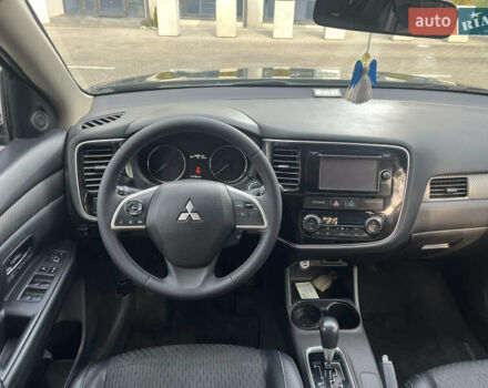 Синий Мицубиси Аутлендер, объемом двигателя 2.36 л и пробегом 187 тыс. км за 9999 $, фото 17 на Automoto.ua